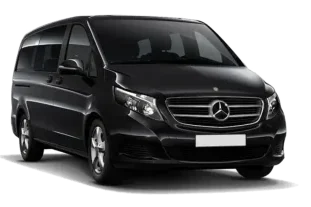 Minibus noire de marque Mercedes, type fourgonnette.